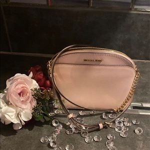 MK GORGEOUS CROSSBODY WITH SIDE POCKET It's 7 H X 8 1/2 W